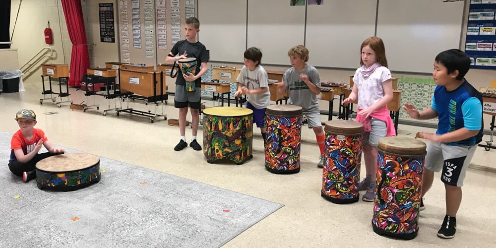 Summit elementary students playing drums