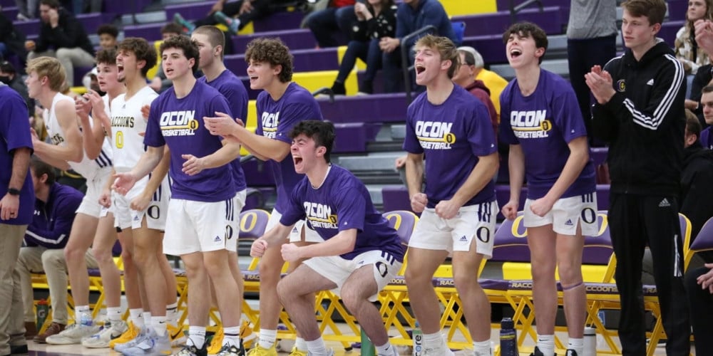 Boys basketball sidelines bringing the energy