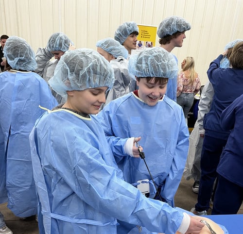 7th-graders explore careers in healthcare at a healthcare expo