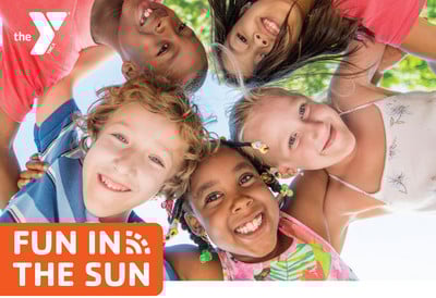 Group of five kids smiling